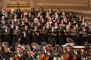 Photo of a choir singing at Carnegie Hall.