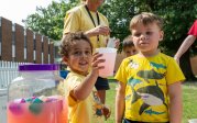 Children serving lemonade