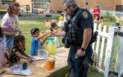 Police officer at lemonade stand