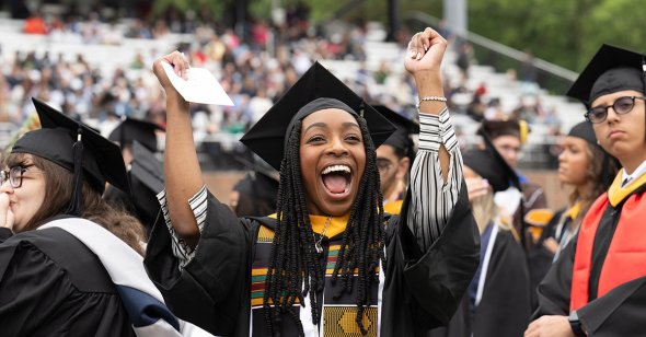 A graduate celebrates during Old Dominion University’s undergraduate Commencement exercise Saturday, May 4, 2024.
