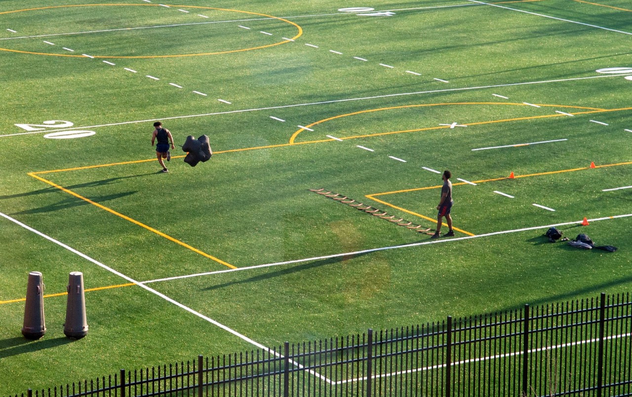 2021-pow-students-working-out-on-the-src-outdoor-field