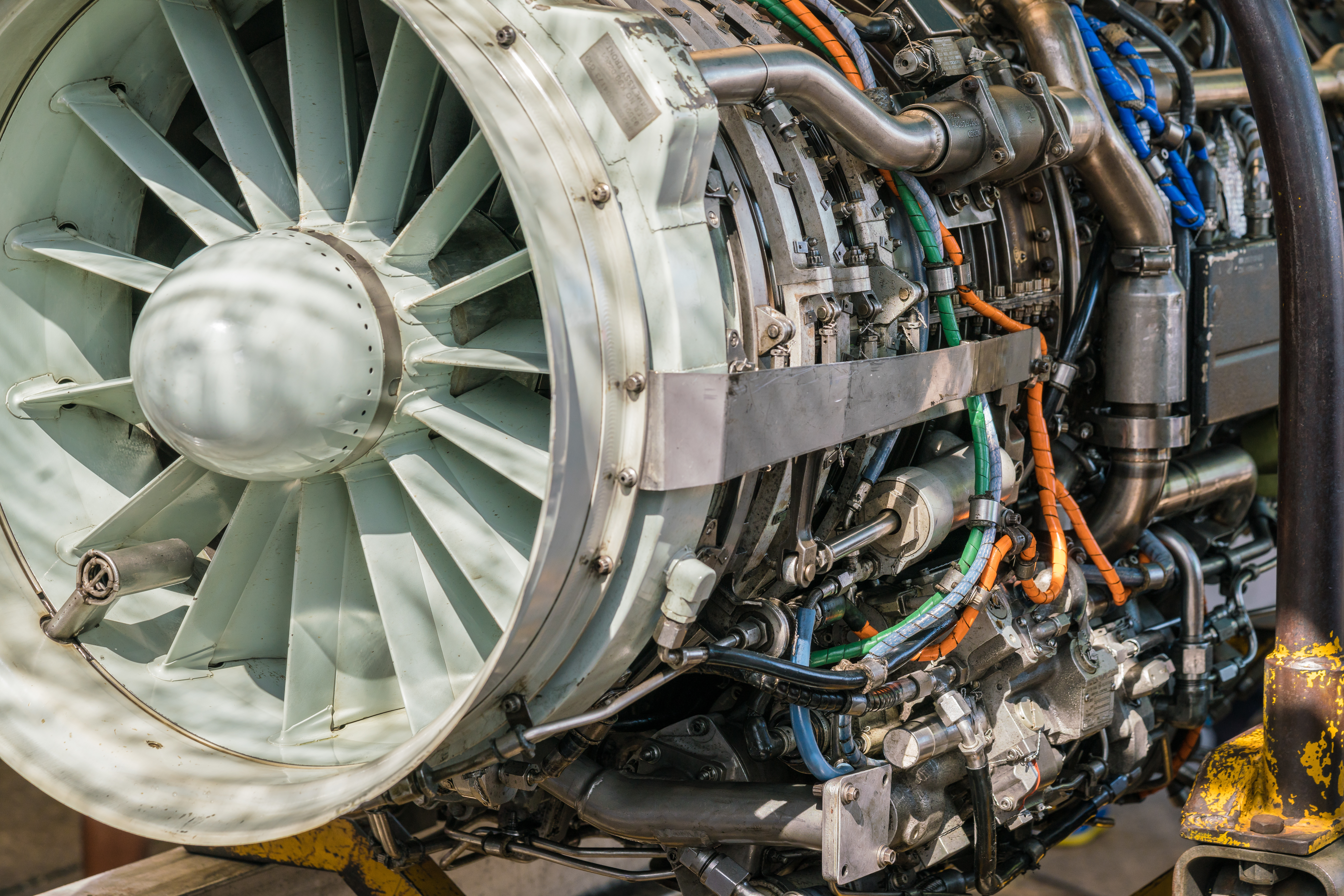Military fighter Jet engine inside - Airplane gas turbine engine detail - Plane rotor under heavy maintenance. 