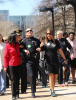 ODU Police officer Jordan Barnes gets a little support from Andretta Smith (left)and Shelby Yancey (right) as he tries to walk in heels. Photo Elyse Penn/ODU