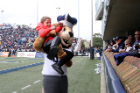 Before the opening kick-off, Big Blue scooped up 7-year-old Colt Davis so his grandfather could take a photo. Photo David B. Hollingsworth/ODU