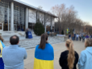 Members of the ODU community listen to a speaker at the Solidarity for Ukraine vigil in front of Webb Center. Photo Amber Kennedy/ODU