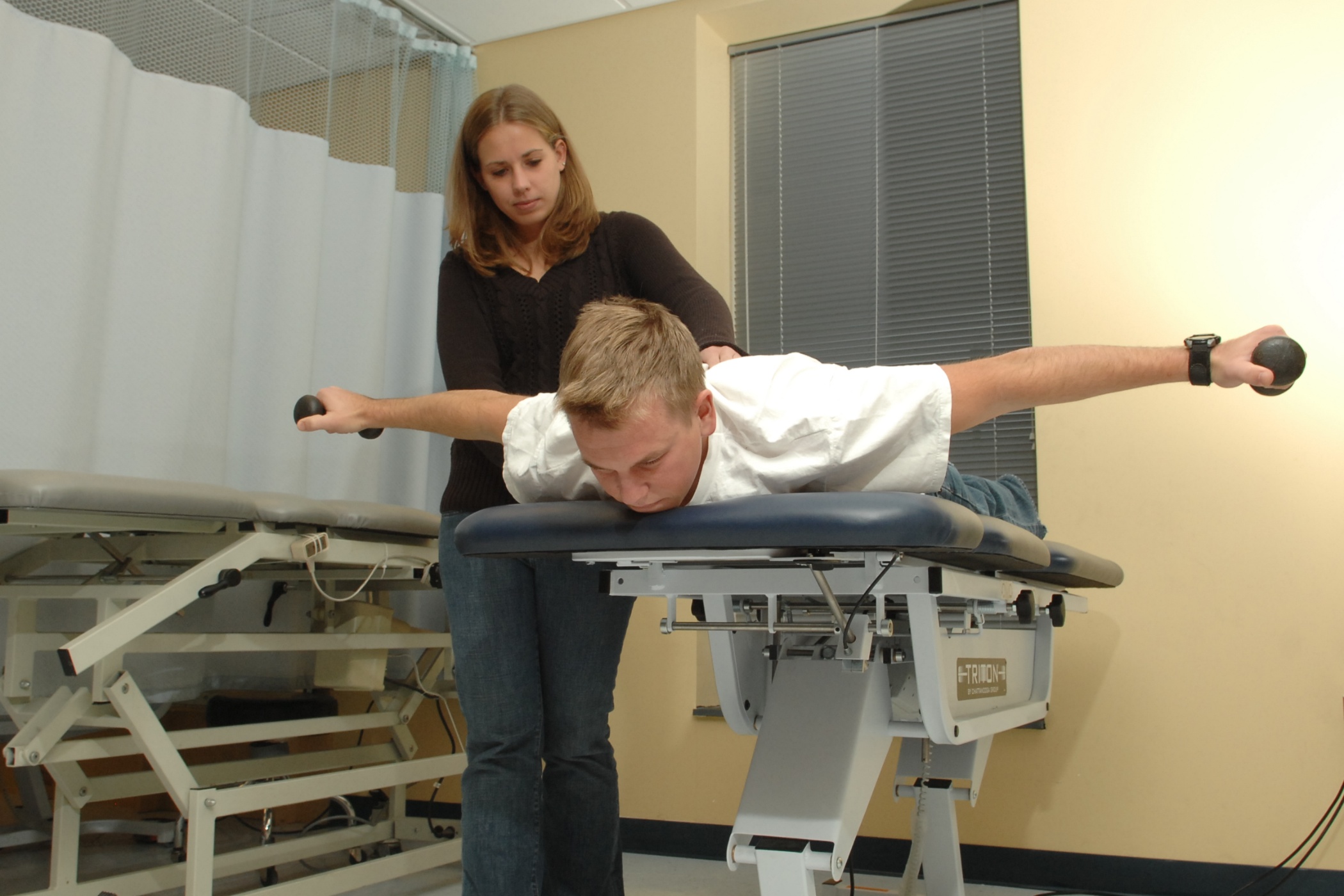 Physical Therapy Students Work on Exercieses 
