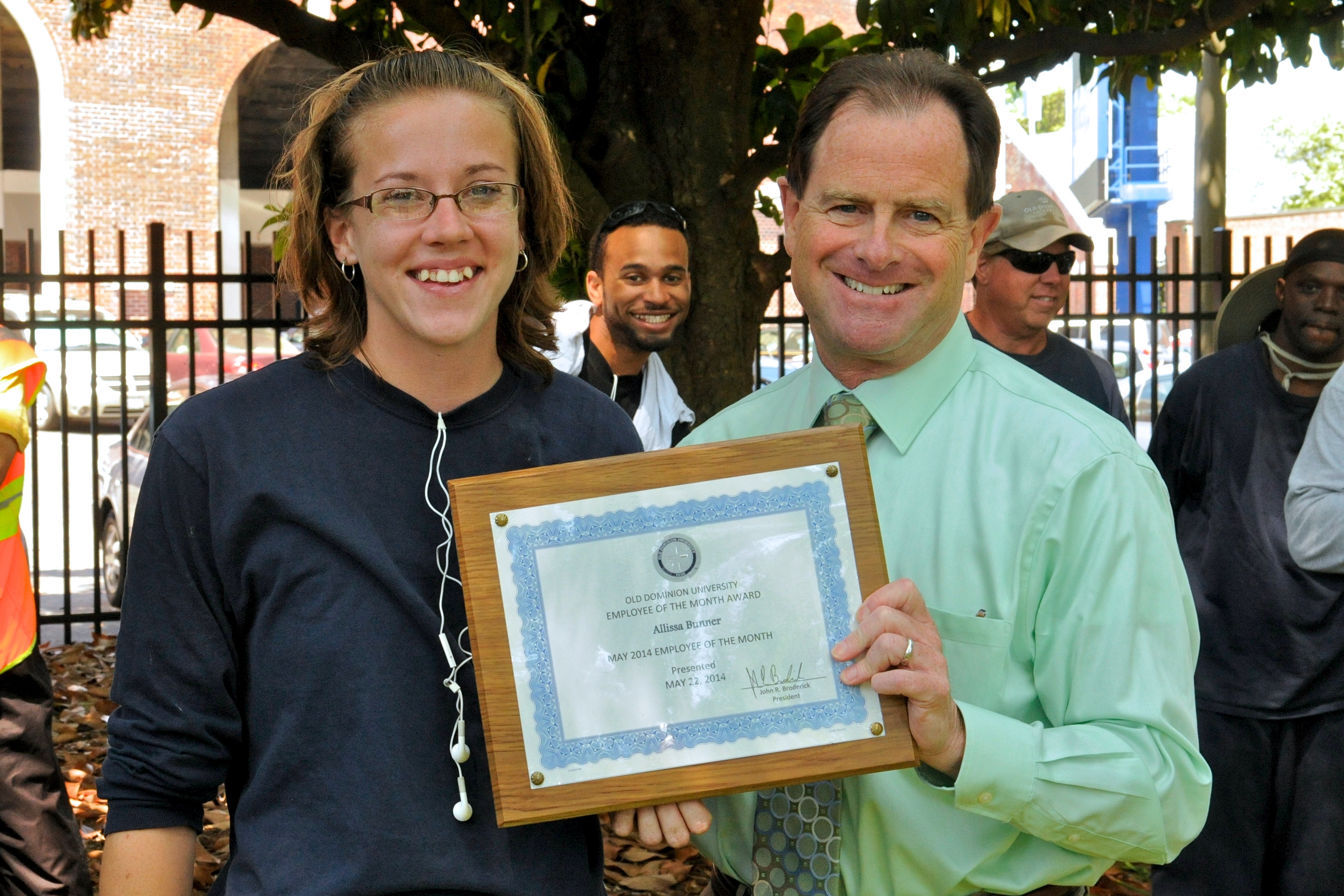 Photo of Allissa Bunner and ODU President John R. Broderick