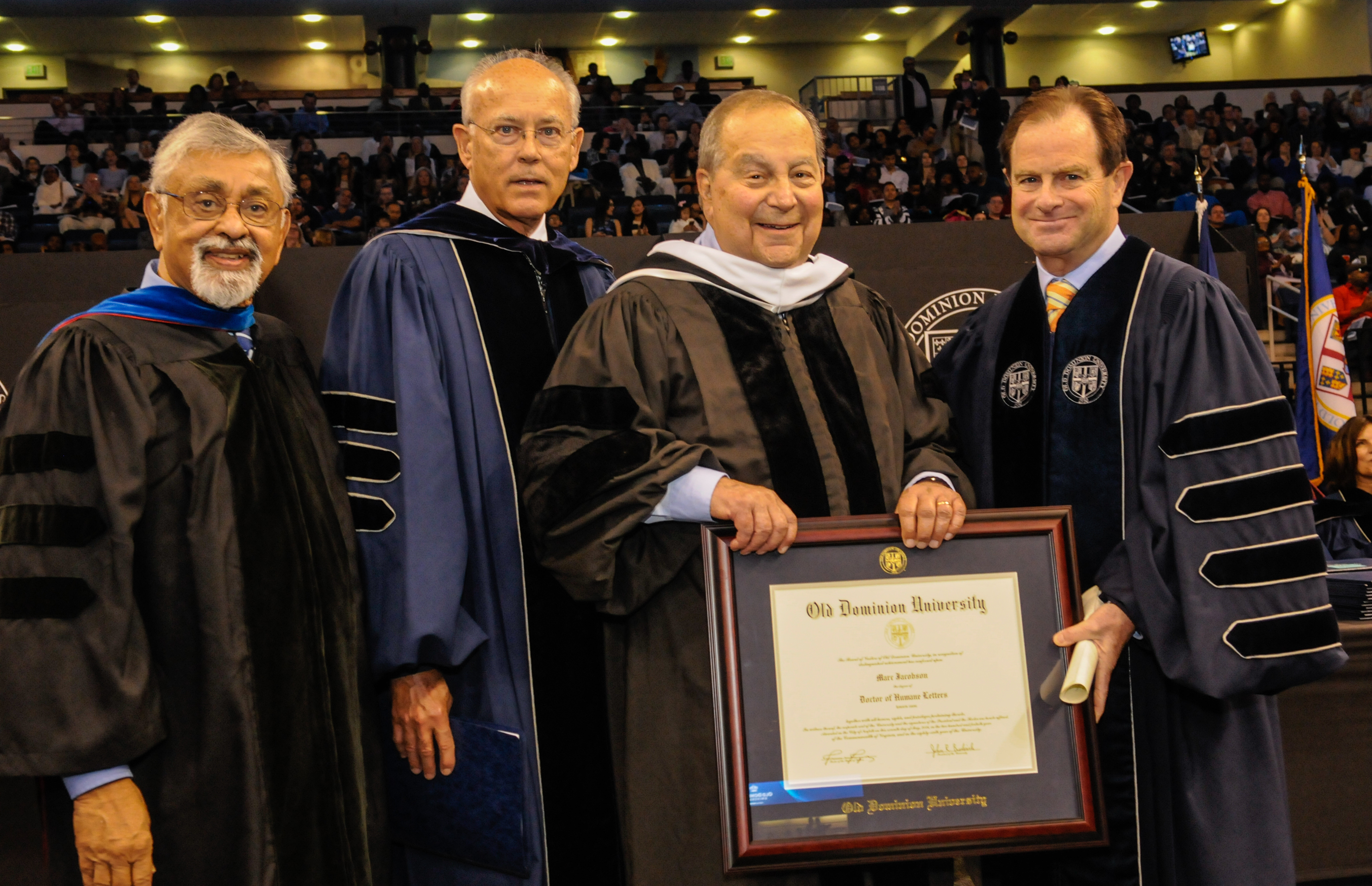 Photo of Marc Jacobson receiving an honor doctorate degree in 2016