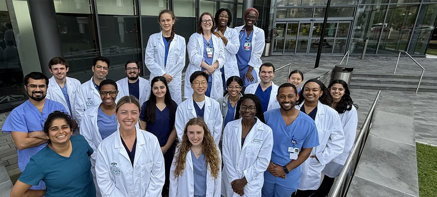 family med residents in front of a building