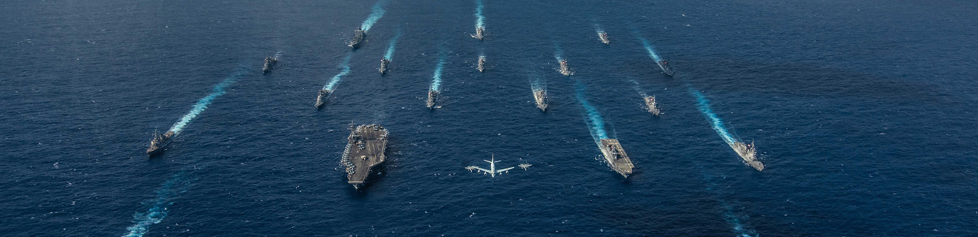 Battle group of Naval ships and planes