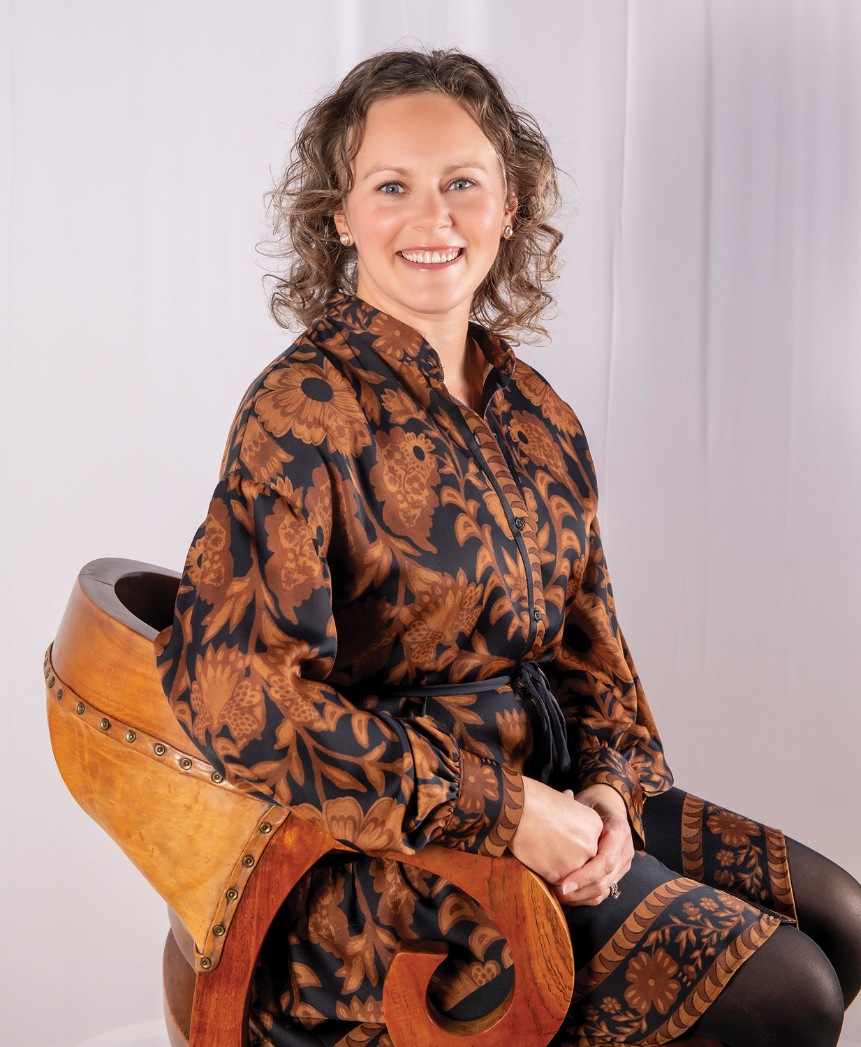 Camille Crofton Cherry sits in chair