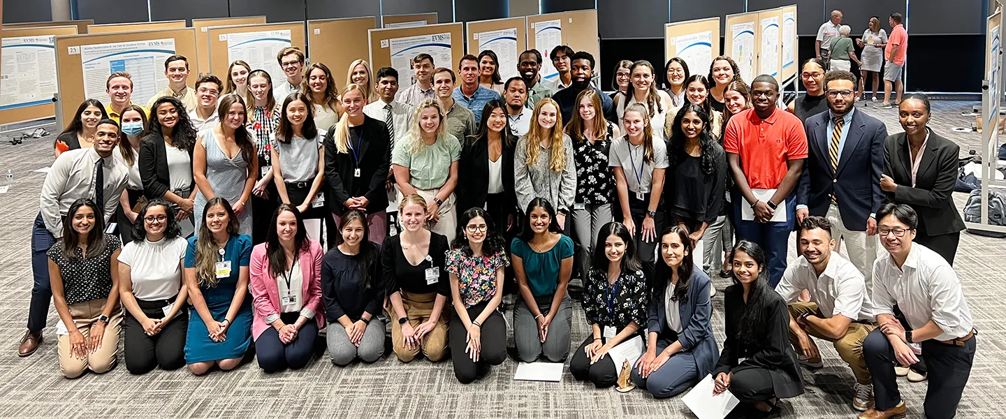 Group of Summer Scholars smile at the camera