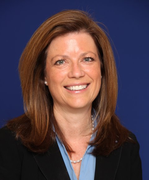 headshot of Tina Gustin