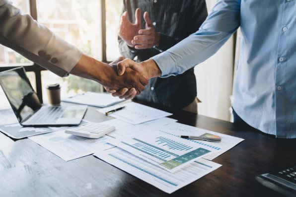 Businessman sales agreement