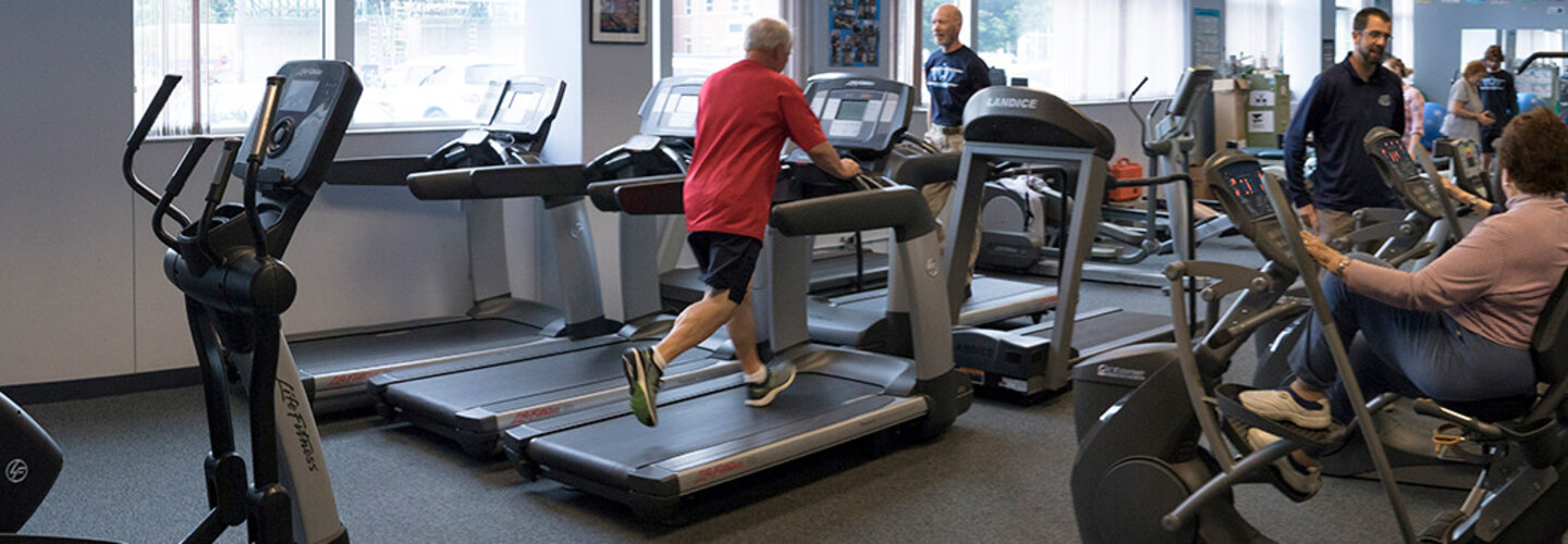 Seniors work out on equipment