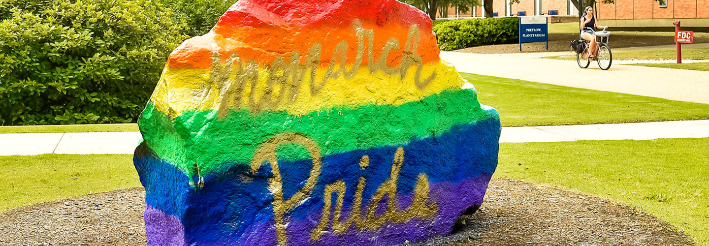 Monarch Pride painted on rock