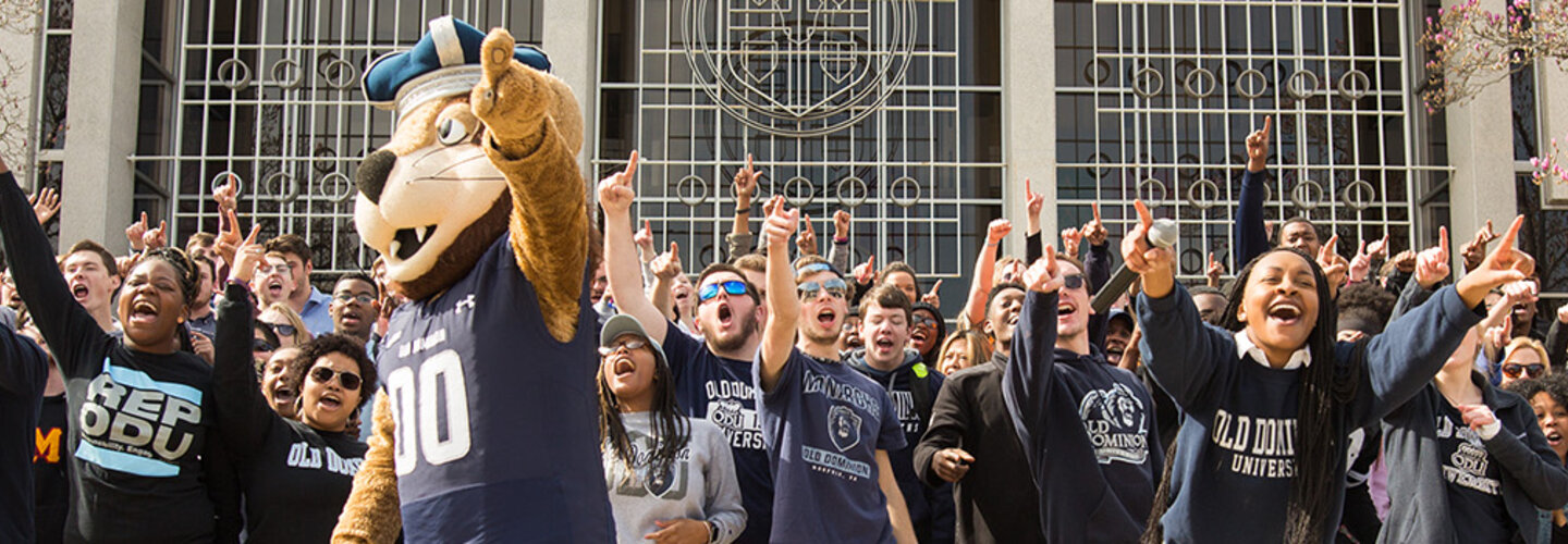 Students cheering with ODU mascot