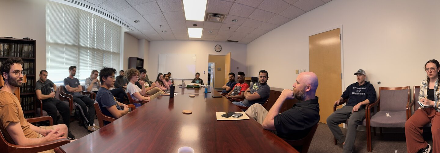 pgsa students in a conference room.