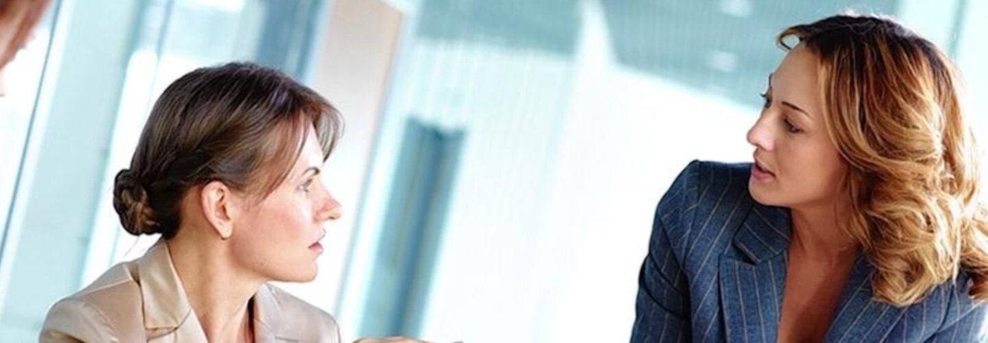 women congregating in workplace