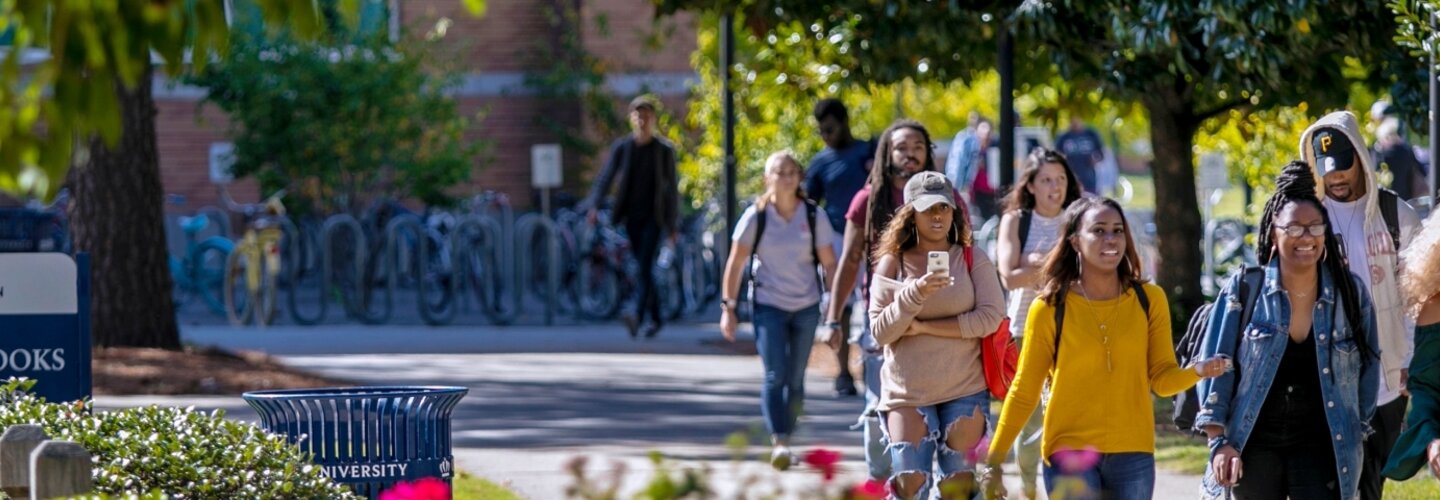 Students walking across campus.