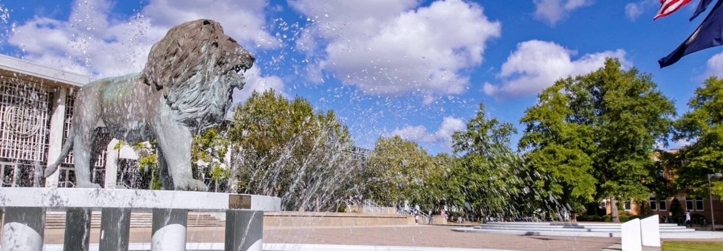Lion fountain with blue skies on Kaufman Mall.