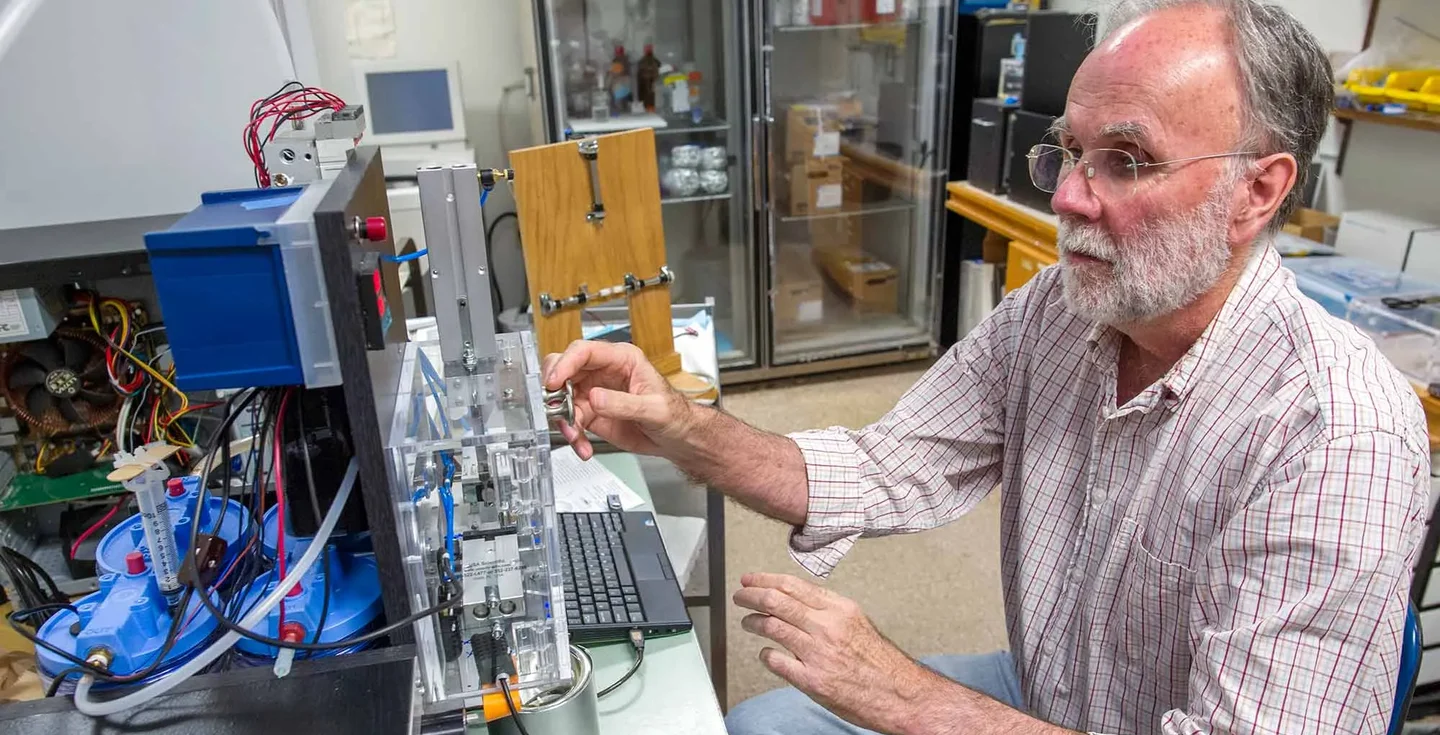 Dr. Howard White in the lab.