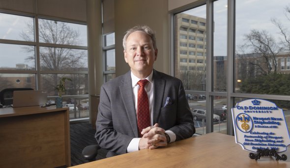 Photo of Rob Gies at a desk
