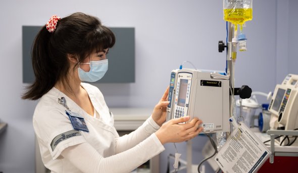 Student using medical equipment