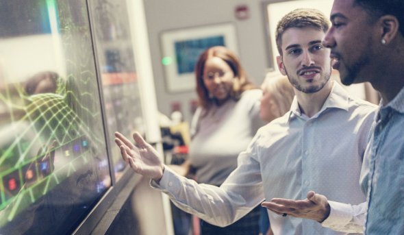 People looking at screen
