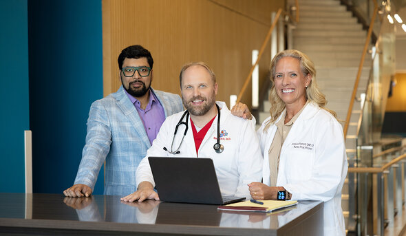 Aditya Chakraborty, Ph.D., collaborating on upcoming research with Jessica Parrott, D.N.P., APRN, and Ben Klick, MD.
