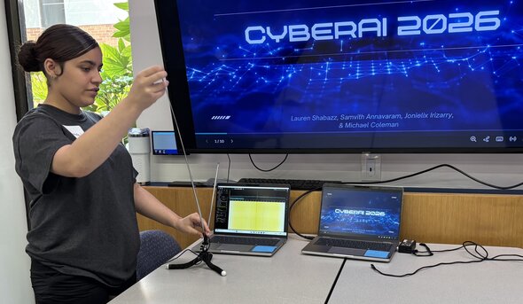 Student adjusts antennae