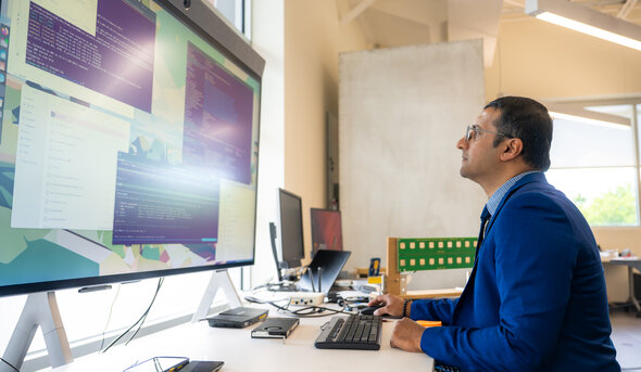 Sachin Shetty at a computer