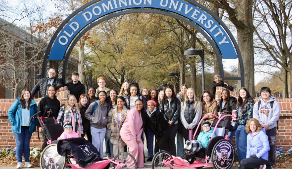 people in front of an ODU sign