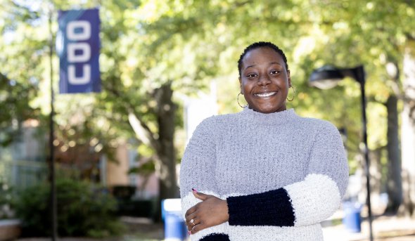 Chiamaka Abjumaki standing on campus