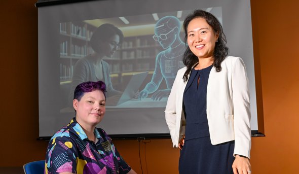 Jinhee Kim and Rita Detrick