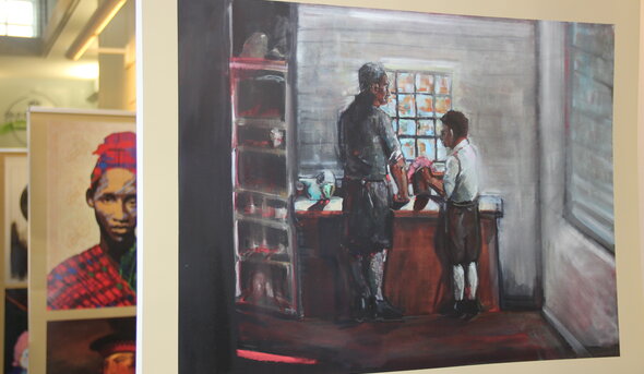 a gallery of paintings in the perry library