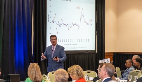 Bob McNab presenting at the midyear economic forecast