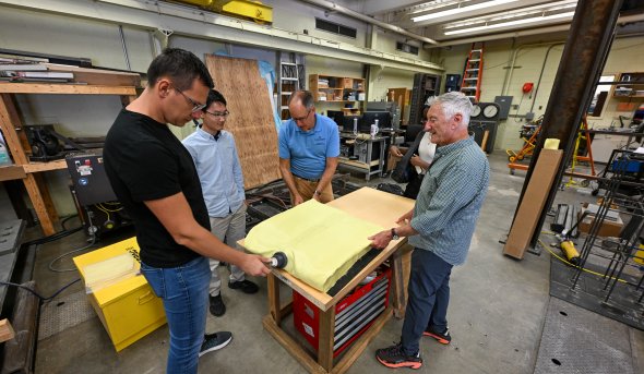 A group of people in a workshop