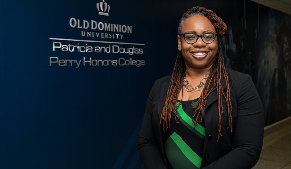 women stands next to interior signage 