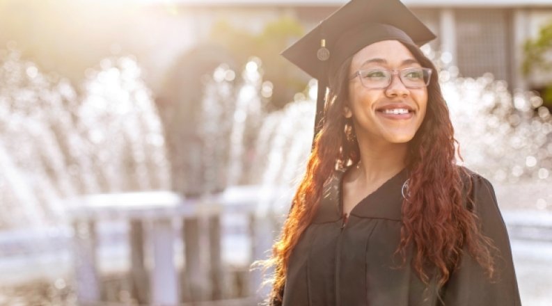 Graduate at fountain