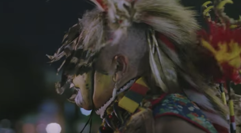 side profile of a native american traditional dancer