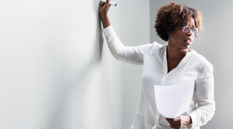 Professor at whiteboard