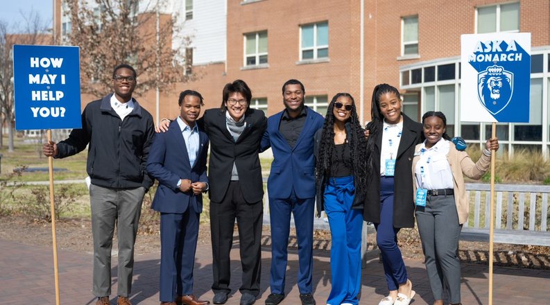Students standing on campus