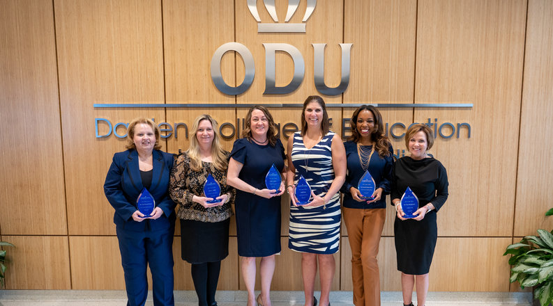 From left: Lisa Duncan Raines, Aileen Smith, Renee Garrett, Cathy Rossi, Shantell Strickland-Davis and Tina Manglicmot hold their awards.