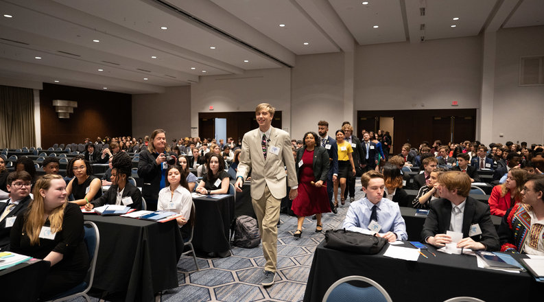 Student at conference