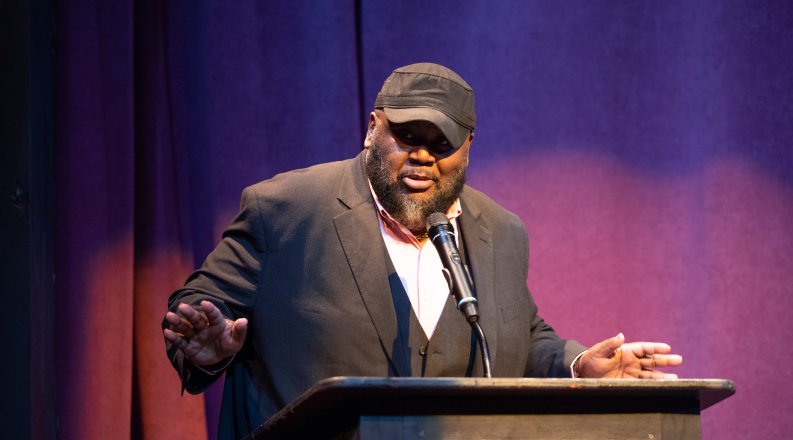 Man speaking to an audience