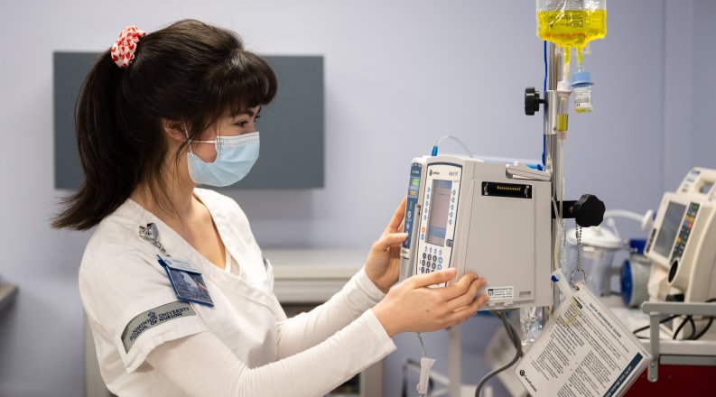 Student using medical equipment