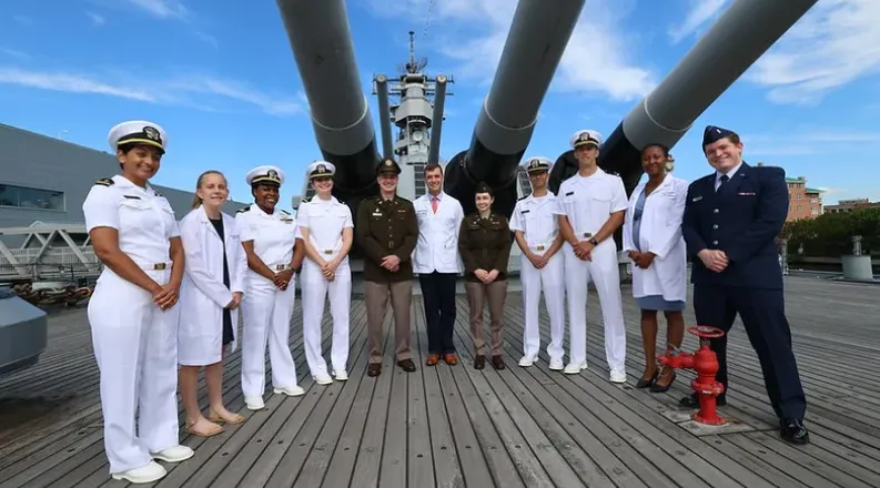 military students on USS Wisconsin for photo