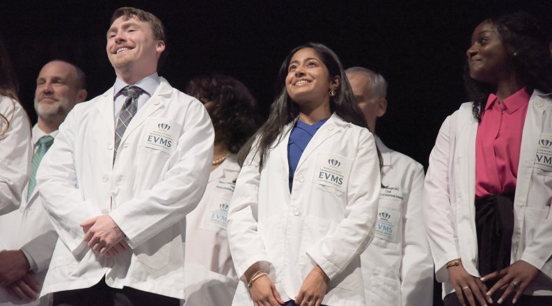 students in white medical coats