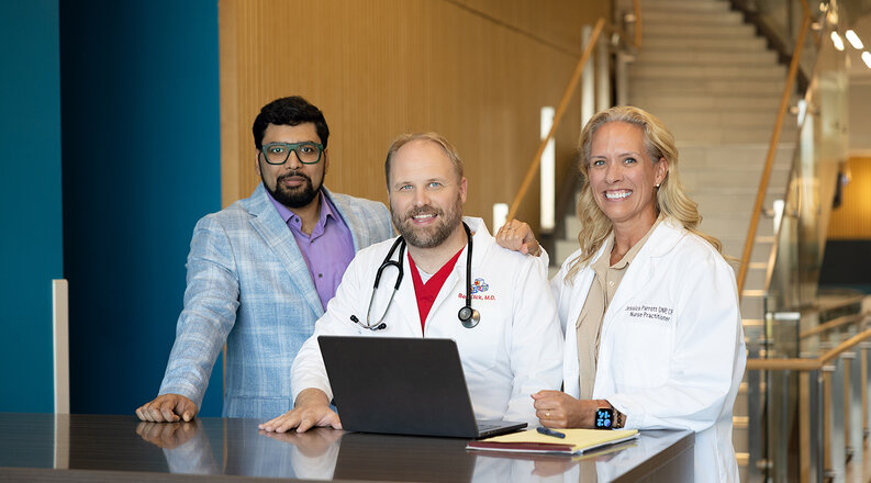 Aditya Chakraborty, Ph.D., collaborating on upcoming research with Jessica Parrott, D.N.P., APRN, and Ben Klick, MD.